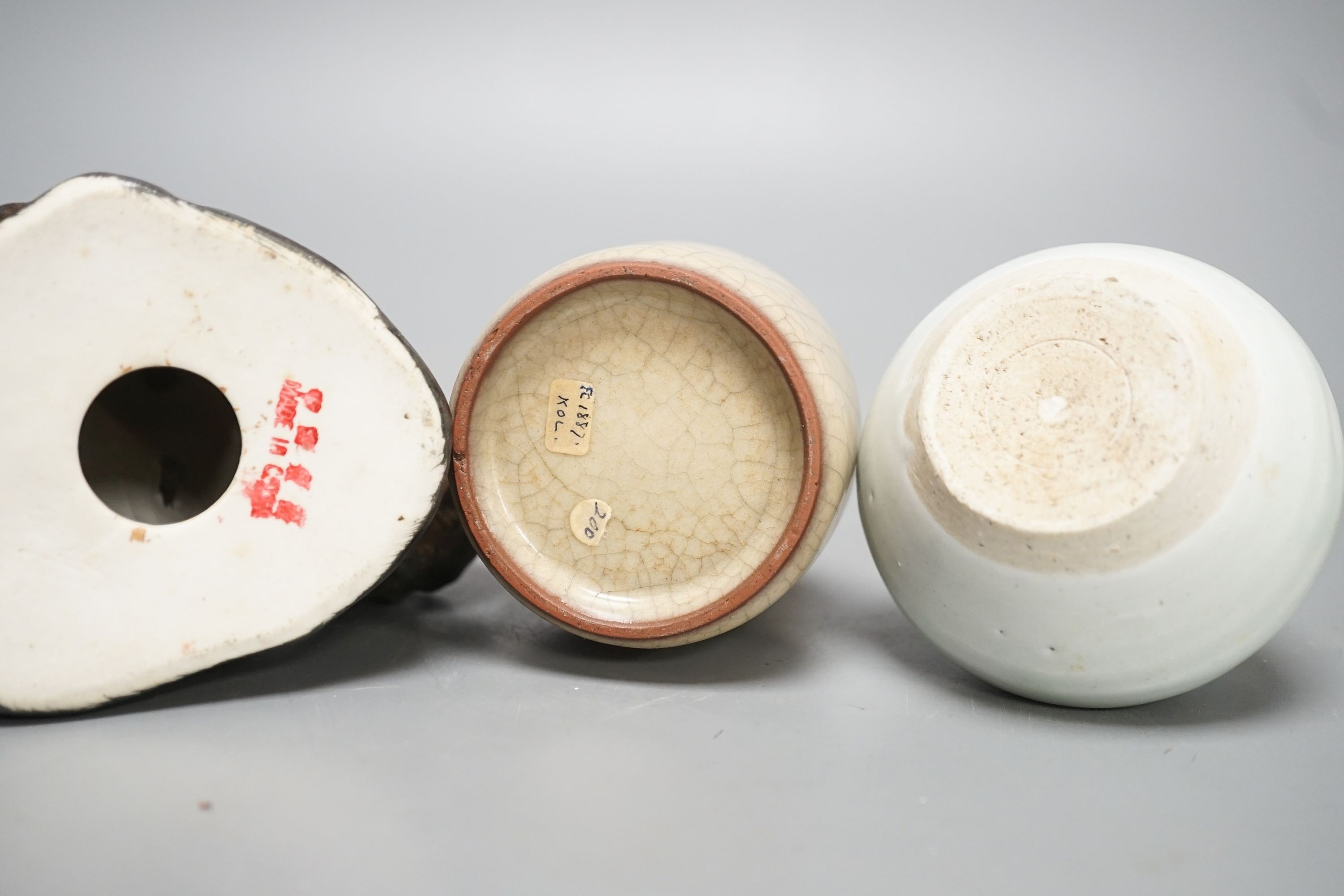 A Chinese porcelain figure, a crackleware jar and a monochrome water pot 20cm